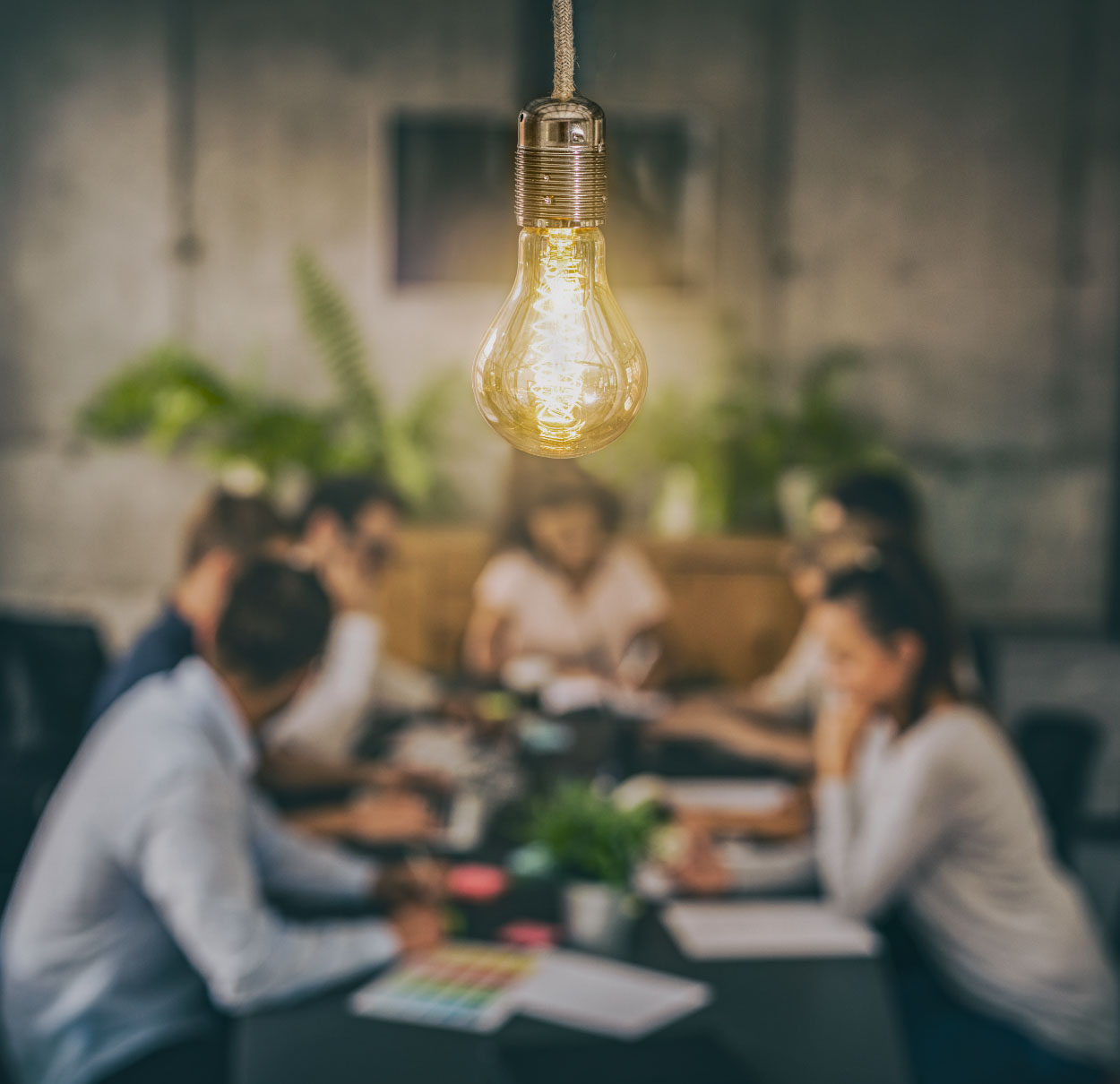 Brainstorming around conference table