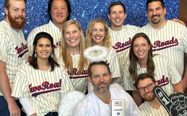 Photo of Two Roads Team with award